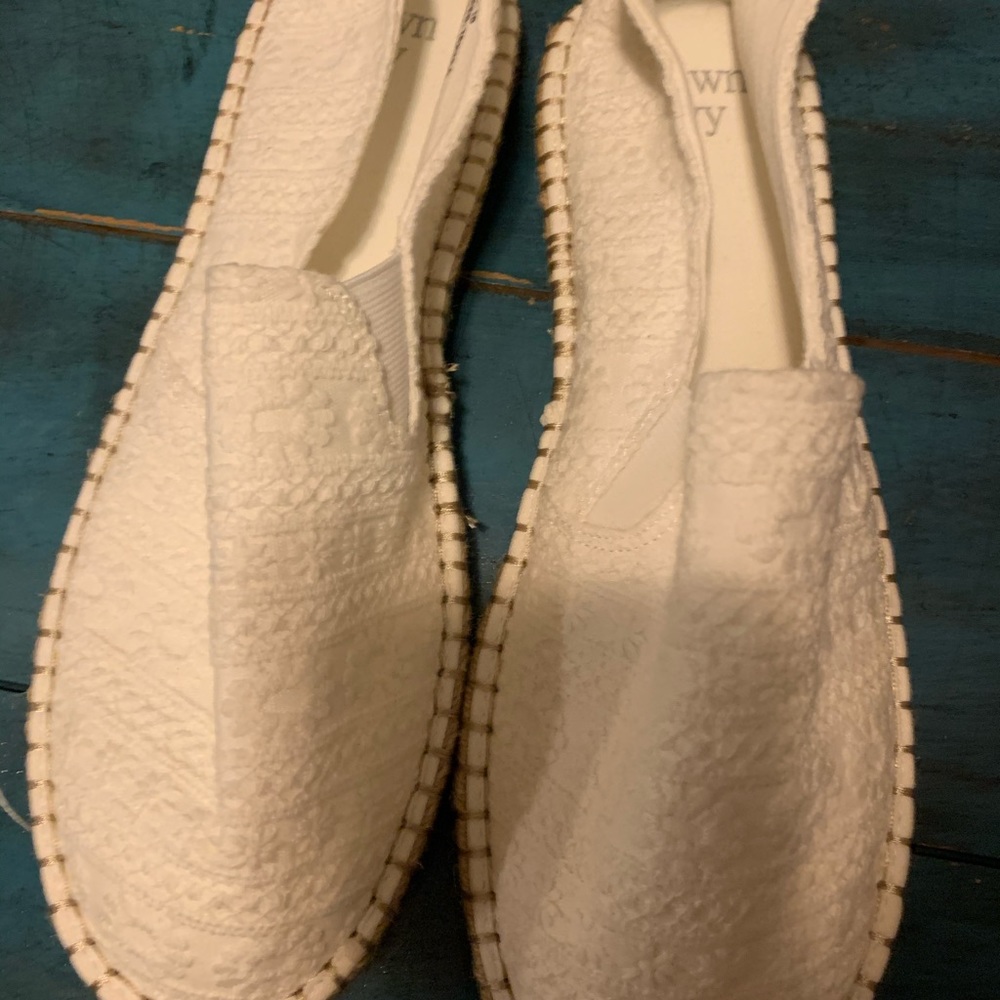 Slip ons. New!  Beautiful white.